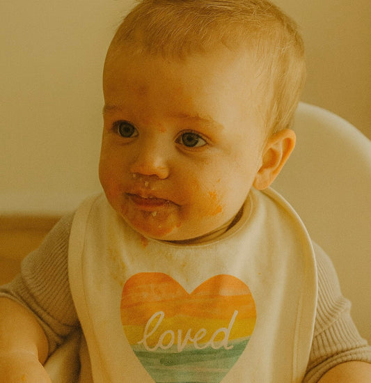 Baby graphic bib | loved rainbow heart finn + emma
