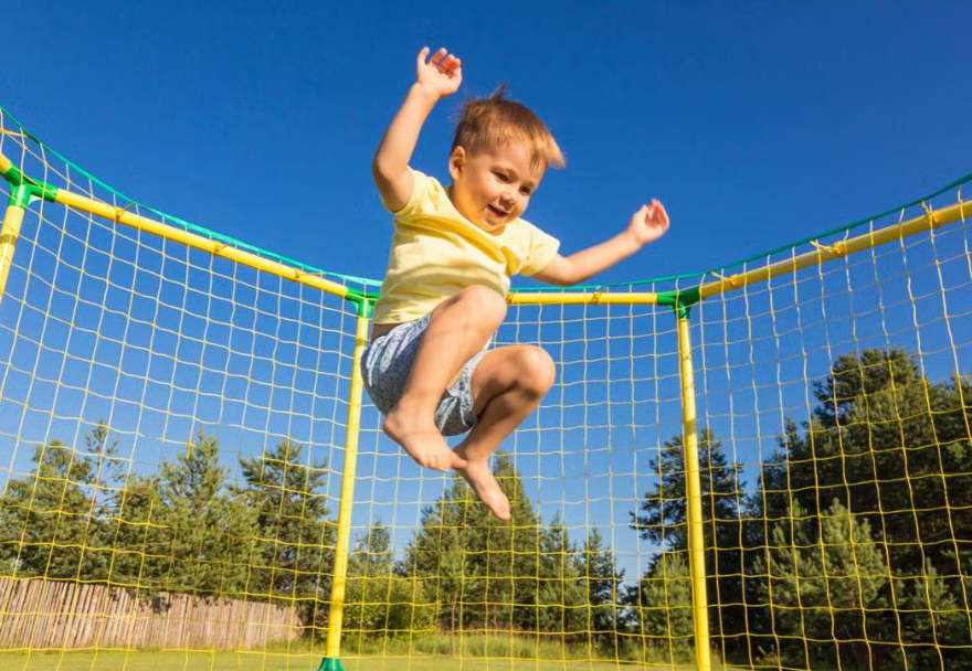 kid on trampoline