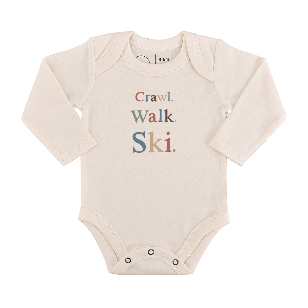 Baby long sleeve graphic bodysuit | crawl walk ski finn + emma